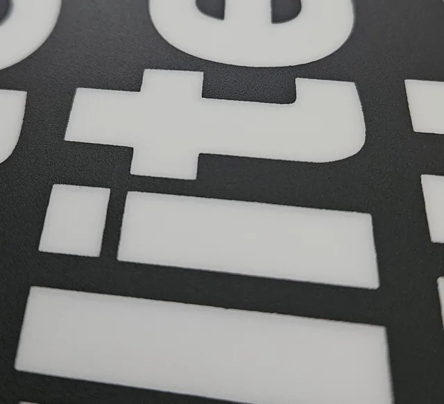 Screen printed polycarbonate label detail